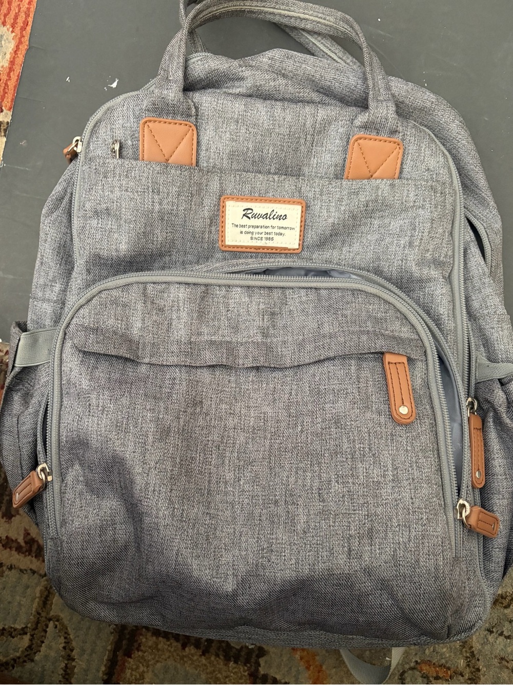 Grey Ruvalino  Backpack diaper bag with Tan Accents.